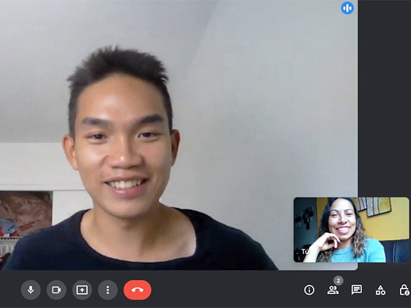 Student and teacher on a screen participating in an online class