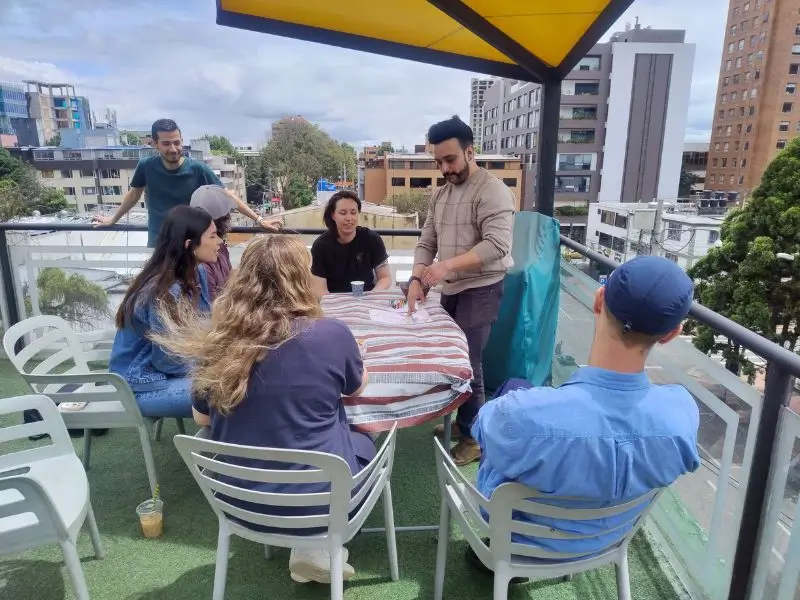 Group of international students learning Colombian Spanish in a classroom at Learn More Than Spanish in Bogotá