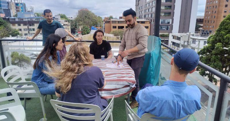 Students practicing Colombian Spanish together during a group class in Bogotá.