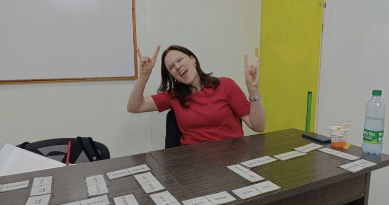 Happy international student studying Spanish in a classroom in Bogotá