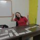 Happy international student studying Spanish in a classroom in Bogotá