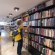 Spanish student browsing books in a bookstore in Bogotá